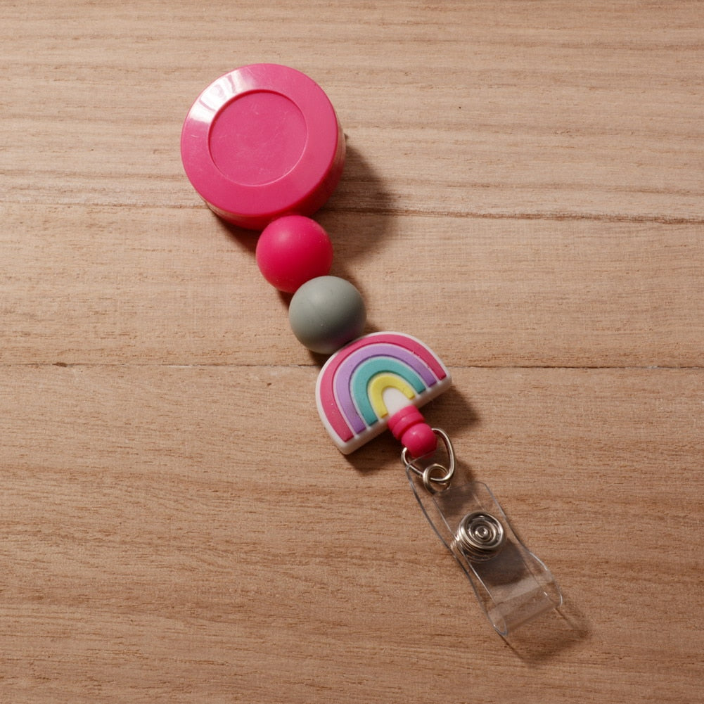 Porte Badge blouse infirmière "Arc en Ciel" charm's